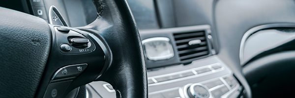 Black vehicle steering wheel has advanced safety technology buttons