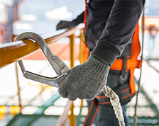 Construction worker attached to harness 