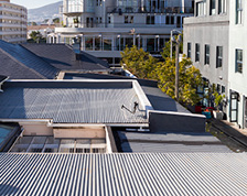 Various commercial building roofs in an urban area