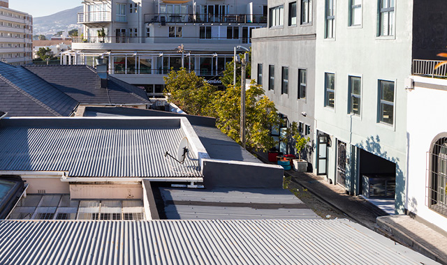 Various commercial building roofs in an urban area