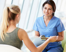 nurse communicating with patient