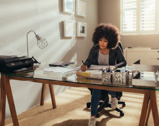 woman working at desk in home office