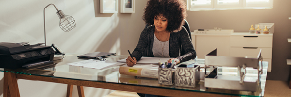 woman working at desk in home office
